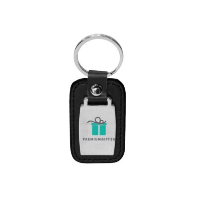 KC27 PU leather keychain with metal plate insert. Ideal for engraving and full-colour logo printing. Premium corporate gift for branding.